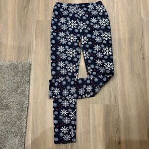 Cozy fleece lined winter leggings.  Snowflake motif.  Super cozy and warm.